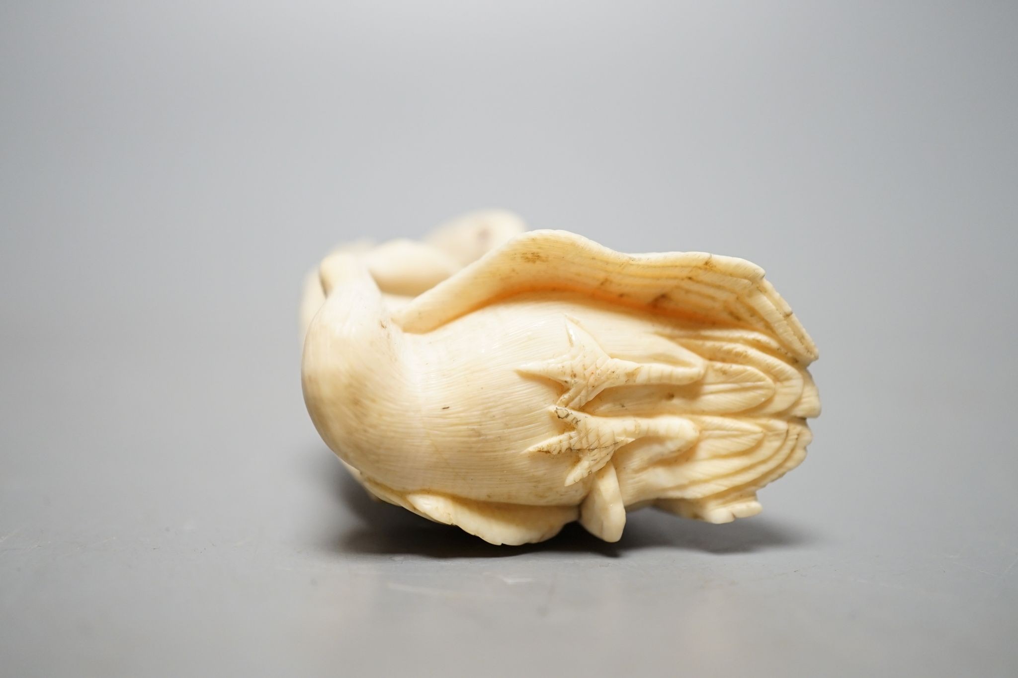 A Japanese ivory eagle and goose okimono, 5.5cm